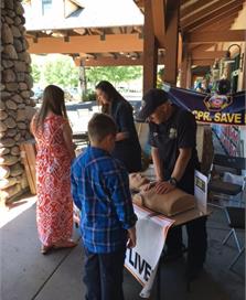 EMTs Teaching CPR to Kids